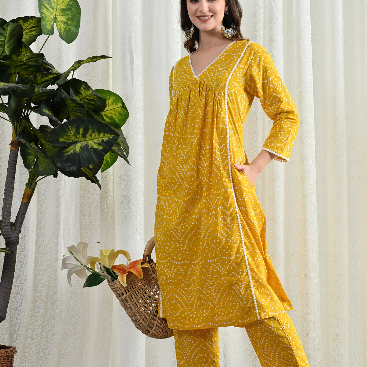 Women Yellow Bandhani Printed Straight Kurta With Three Quarter Sleeves